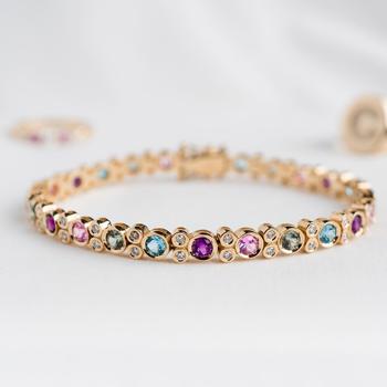 Armband aus 14 Karat Gold mit Diamanten, rosa Saphir, grünem Saphir, blauem Topas und Amethyst