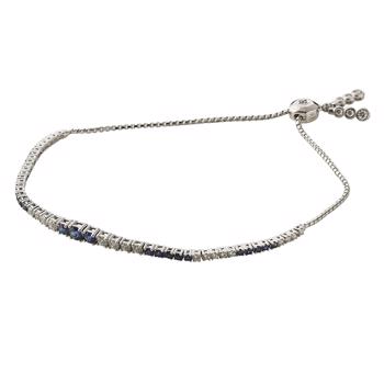 Tennisarmband mit blauem Saphir und Diamanten
