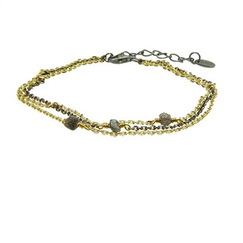 Dreireihiges Armband aus Gold und Schwarz mit rauen, anthrazitfarbenen Steinen und Verlängerungskette.