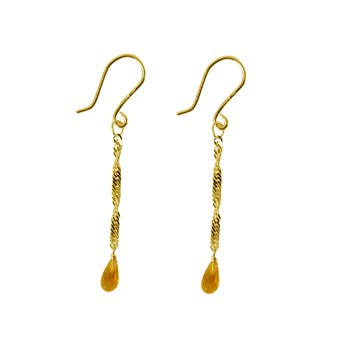 Elegante goldene Ohrringe mit gedrehtem Design und tropfenförmigem Citrin-Stein.