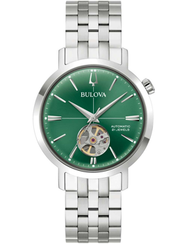 Grüne Bulova-Uhr mit offenem Herz-Design, Metallarmband, "Automatic" und "21 Jewels" auf Zifferblatt.