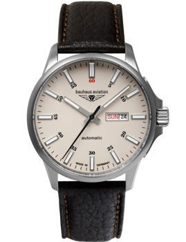 Beige Zifferblatt mit "bauhaus aviation", schwarze Markierungen, Datum, schwarzes Armband mit Nähten.