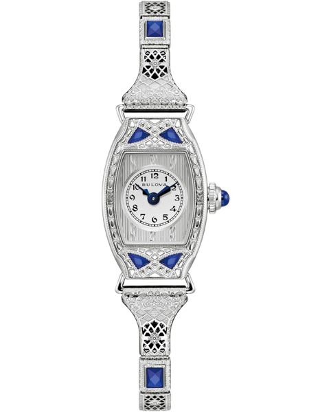 Rechteckige Uhr mit blauen Akzenten, Bulova-Zifferblatt, filigranes Armband mit blauen Steinen.