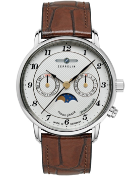 Klassische Uhr mit weißem Zifferblatt, braunem Lederarmband, Mondphase, Wochentag und Datum.