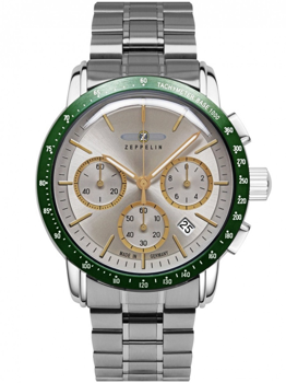 Silbernes Zifferblatt, goldene Details, drei Hilfszifferblätter, Datumsfenster, grüner Tachymeter.
